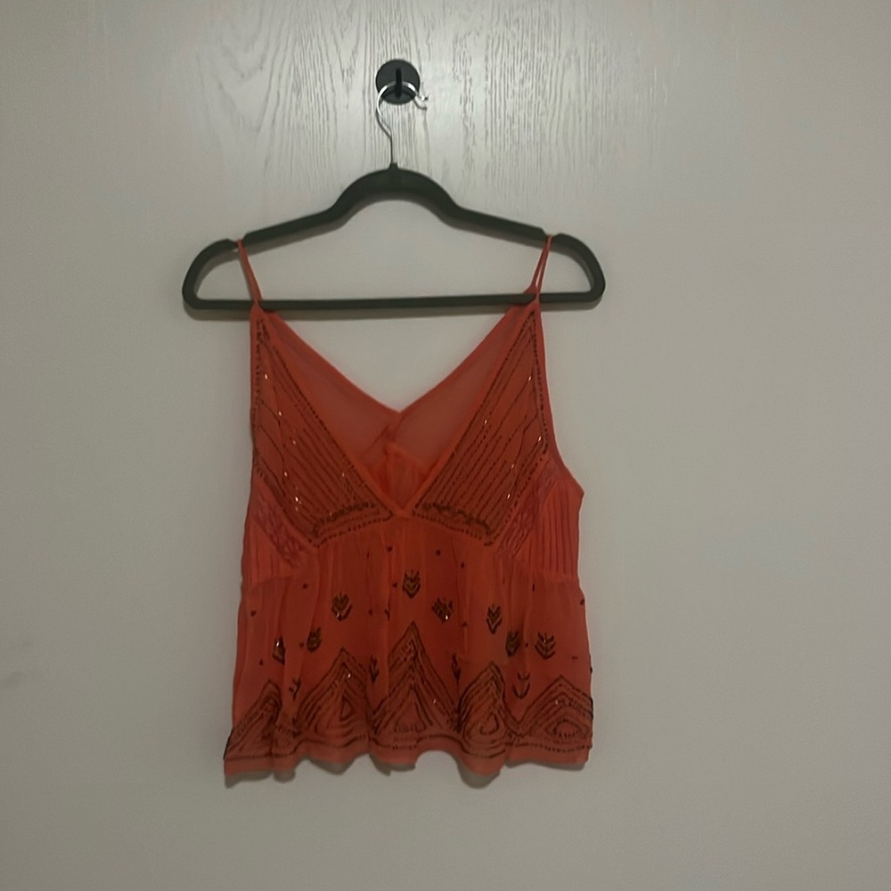 pink flowy tank too with beads